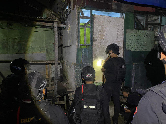 Personel gabungan kepolisian melakukan penyisiran. [Istimewa]